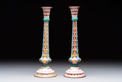 A pair of Chinese Canton enamel 'lotus' candlesticks, Yongzheng