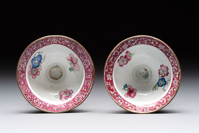 A pair of Chinese Canton enamel 'lotus' candlesticks, Yongzheng