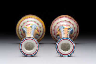 A pair of Chinese Canton enamel 'lotus' candlesticks, Yongzheng
