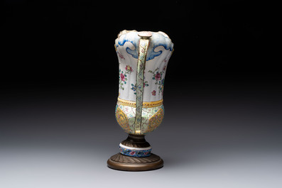 A Chinese Canton enamel helm-shaped ewer and an oval basin, Qianlong