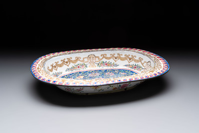 A large Chinese Canton enamel basin with garlands decorated with male heads, Qianlong