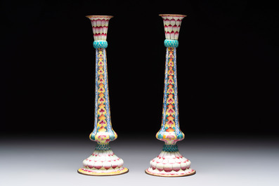 A pair of Chinese Canton enamel 'lotus' candlesticks, Yongzheng