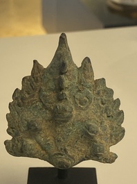 Three bronze Khmer palanquin hooks, a bell and a dagger, Angkor Wat periode, Thailand, 12th C.