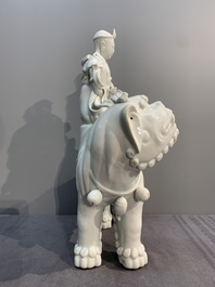Two Chinese white-glazed Bodhisattvas, a sancai-glazed duck and a turquoise-glazed lion, 20th C.