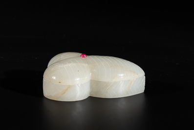 A Chinese Mughal-style leaf-shaped ruby-inset jade box and cover on wooden base, 18th C.