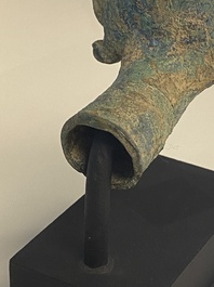 Three bronze Khmer palanquin hooks, a bell and a dagger, Angkor Wat periode, Thailand, 12th C.