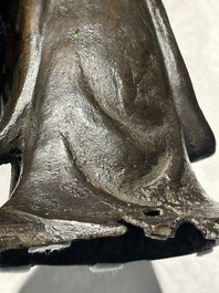 A Chinese bronze figure of a standing Guanyin, Ming