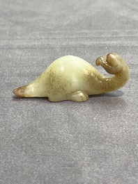 Three Chinese celadon and russet jade carvings of animals, 19th C.