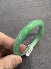 Two Chinese jadeite bracelets, one with 14K gold mounts, 19/20th C.