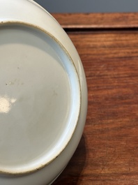 A pair of Chinese famille rose 'peony and butterfly' plates, Yongzheng/Qianlong