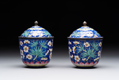 A pair of Chinese blue-ground Canton enamel covered bowls on stands and an egg cup, Qianlong/Jiaqing