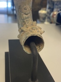 Three bronze Khmer palanquin hooks, a bell and a dagger, Angkor Wat periode, Thailand, 12th C.