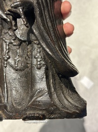 A Chinese bronze figure of a standing Guanyin, Ming