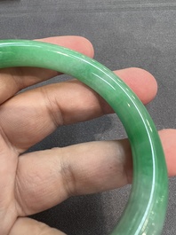 Two Chinese jadeite bracelets, one with 14K gold mounts, 19/20th C.