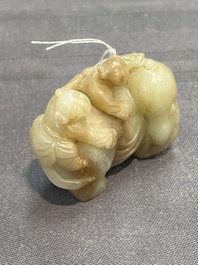 Three Chinese celadon and russet jade carvings of animals, 19th C.