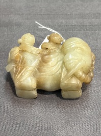 Three Chinese celadon and russet jade carvings of animals, 19th C.