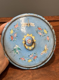 A Chinese Canton enamel blue-ground circular hand mirror, early 19th C.
