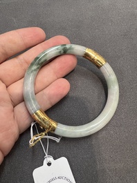 Two Chinese jadeite bracelets, one with 14K gold mounts, 19/20th C.