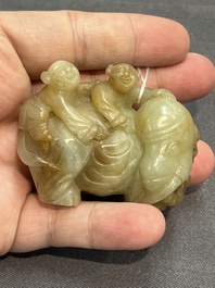 Three Chinese celadon and russet jade carvings of animals, 19th C.
