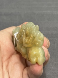 Three Chinese celadon and russet jade carvings of animals, 19th C.