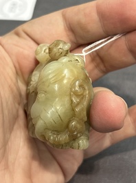 Three Chinese celadon and russet jade carvings of animals, 19th C.