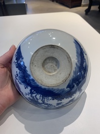 A Chinese blue and white 'Bleu de Hue' 'roosters and chick' plaque in a carved wooden screen and a bowl, 19th C.