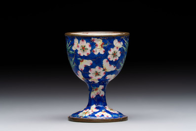 A pair of Chinese blue-ground Canton enamel covered bowls on stands and an egg cup, Qianlong/Jiaqing