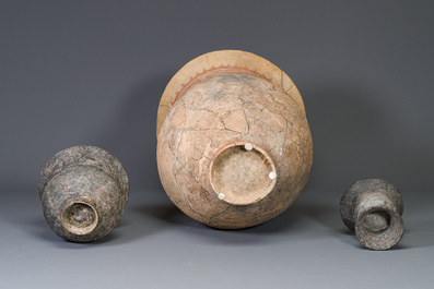A massive Ban Chiang culture pottery vessel and two grey pottery jars, Thailand 7/4th C. B.C.