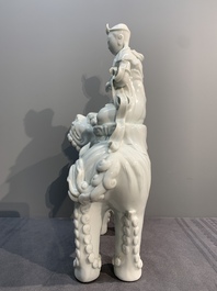 Two Chinese white-glazed Bodhisattvas, a sancai-glazed duck and a turquoise-glazed lion, 20th C.