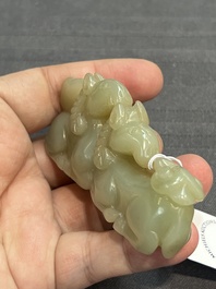 Three Chinese celadon and russet jade carvings of animals, 19th C.