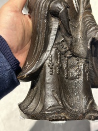 A Chinese bronze figure of a standing Guanyin, Ming