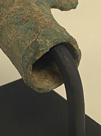 Three bronze Khmer palanquin hooks, a bell and a dagger, Angkor Wat periode, Thailand, 12th C.