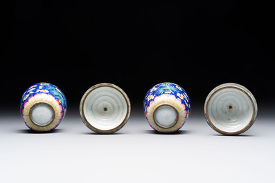 A pair of Chinese blue-ground Canton enamel covered bowls on stands and an egg cup, Qianlong/Jiaqing