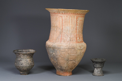 A massive Ban Chiang culture pottery vessel and two grey pottery jars, Thailand 7/4th C. B.C.