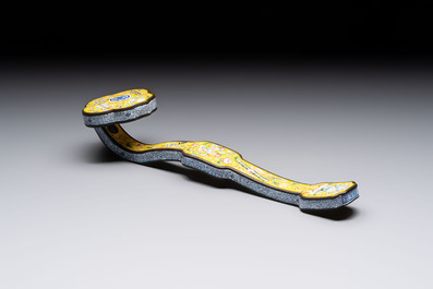 A Chinese Beijing enamel yellow-ground 'Bajixiang' ruyi sceptre, Qianlong mark, 19/20th C.