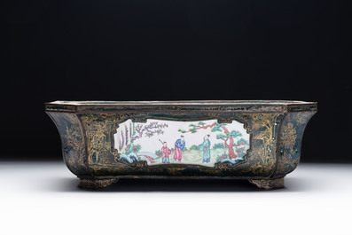 A Chinese Canton enamel gilt-decorated dark-green-ground jardini&egrave;re with four inserted plaques, Qianlong/Jiaqing