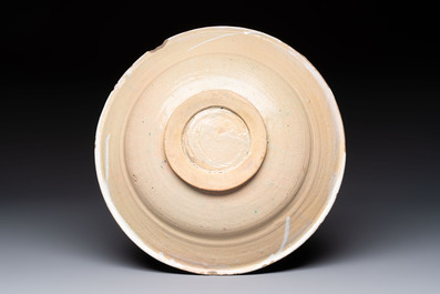 A polychrome maiolica dish and two blue and white dishes, Northern Netherlands, 17/18th C.