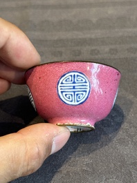 A rare Chinese Canton enamel ruby-ground 'Bats and Shou' cup on stand, Qianlong mark and of the period