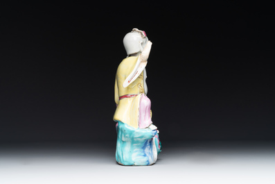 A Chinese famille rose 'Hehe Erxian' group on a wooden stand, Qianlong