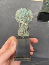 Four Chinese and Vietnamese bronze axes and an arrowhead, Western Zhou/Dong Son