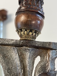 A collection of six krises with carved handles, four with scabbard, Indonesia, 19th C.