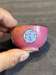 A rare Chinese Canton enamel ruby-ground 'Bats and Shou' cup on stand, Qianlong mark and of the period