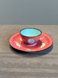 A rare Chinese Canton enamel ruby-ground 'Bats and Shou' cup on stand, Qianlong mark and of the period