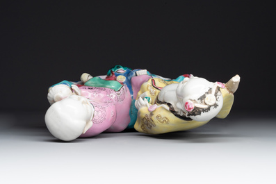 A Chinese famille rose 'Hehe Erxian' group on a wooden stand, Qianlong