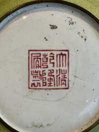 A rare Chinese Canton enamel ruby-ground 'Bats and Shou' cup on stand, Qianlong mark and of the period
