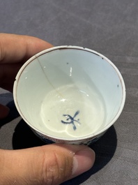 A pair of Chinese polychrome-decorated cups and saucers and an iron-red gilt-decorated cup and saucer, Yongzheng/Qianlong