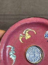 A rare Chinese Canton enamel ruby-ground 'Bats and Shou' cup on stand, Qianlong mark and of the period