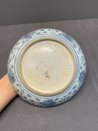 A Chinese blue and white 'phoenix' dish and two 'Buddhist lion' and 'peony' plates, Hongzhi/Zhengde