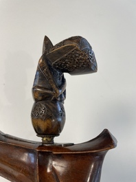 A collection of six krises with carved handles, four with scabbard, Indonesia, 19th C.