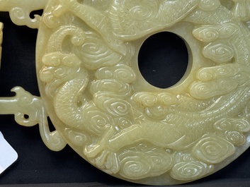 An imperial Chinese yellow jade 'dragon and phoenix' twin 'bi' disc, Qing